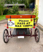 Load image into Gallery viewer, Vinyl PASS  AT MAX 10MPH banner for the back of a carriage. Yellow, orange or Pink.  Optional red flashing LED lights.